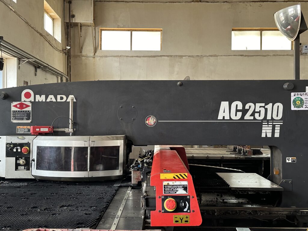 alt="AMADA AC2510NT CNC Punch"