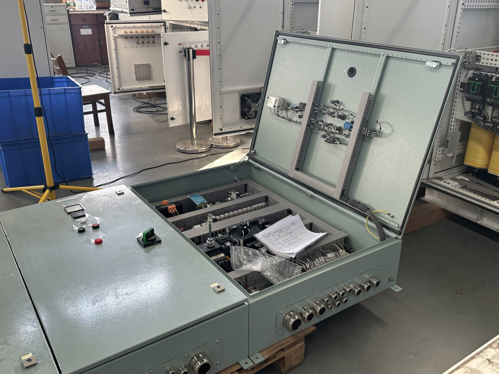 alt="electrical distribution panel board"