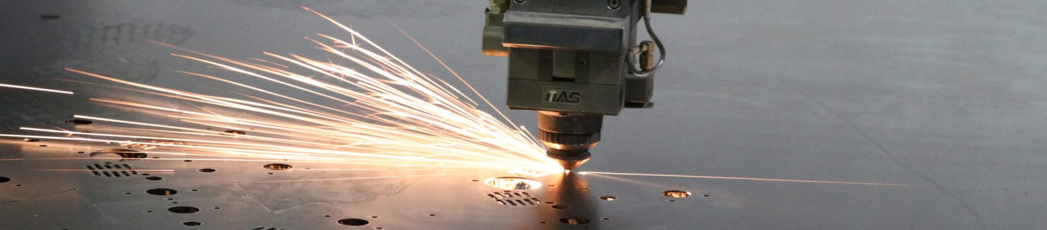 alt="laser cutting fabrication"